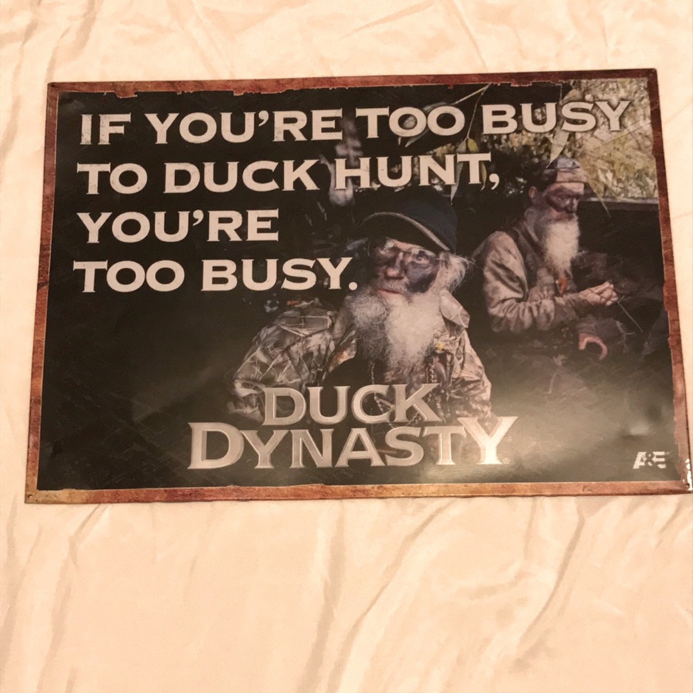 Man-cave Duck Dynasty metal sign about too busy for duck hunting